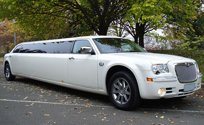 Chrysler 300C Stretch in light beige with capacity for 10 persons has on-board bar and sound system.
