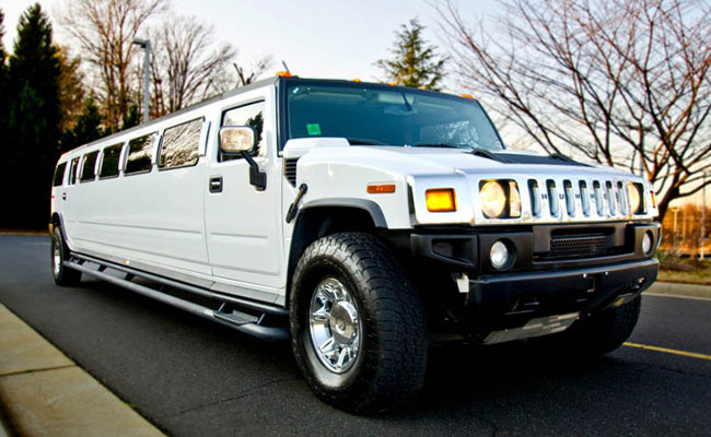 Hummer H2 Stretch for 14 persons is available in black colour and has on-board bar and sound system.